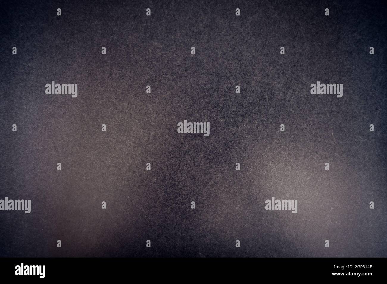 Black hammered metal plate. Background texture wallpaper Stock Photo