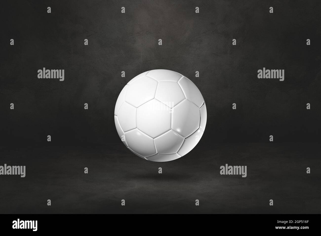 White soccer ball isolated on a black studio background. 3D ...
