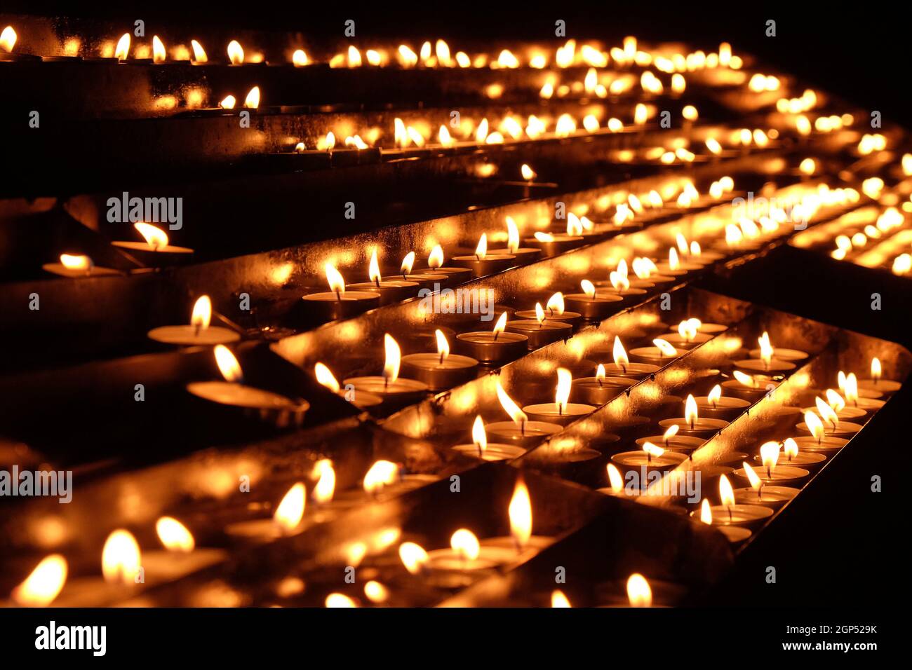 Lit candles on the altar of Our Lady in the Cathedral of the Assumption