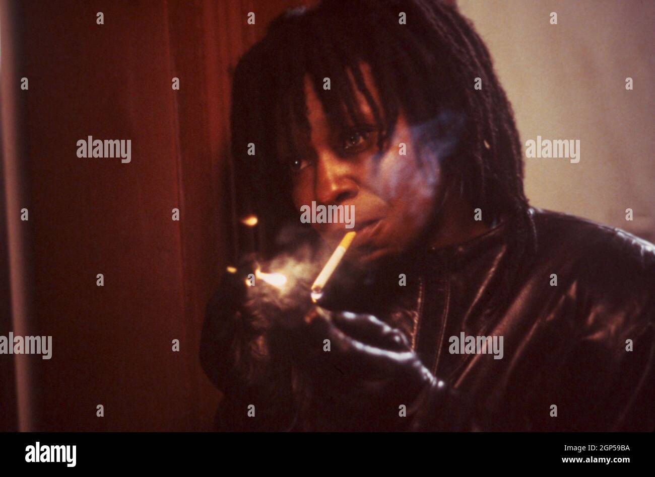 goldberg cigarette BURGLAR, Whoopi Goldberg, 1987. © Warner Bros. / Courtesy Everett  Collection Stock Photo