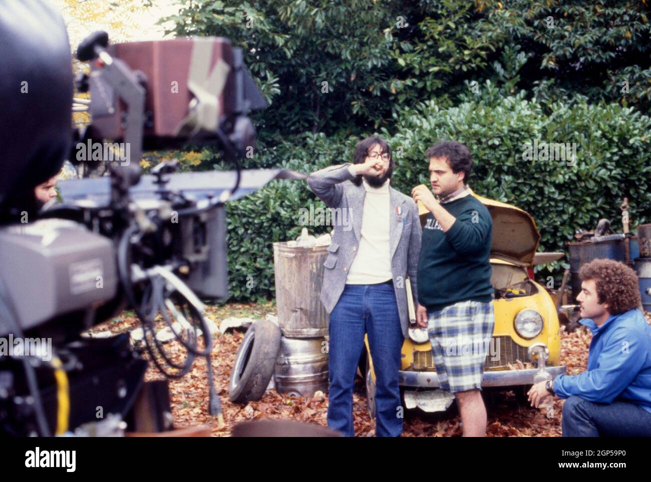 NATIONAL LAMPOON'S ANIMAL HOUSE, center from left director John Landis
