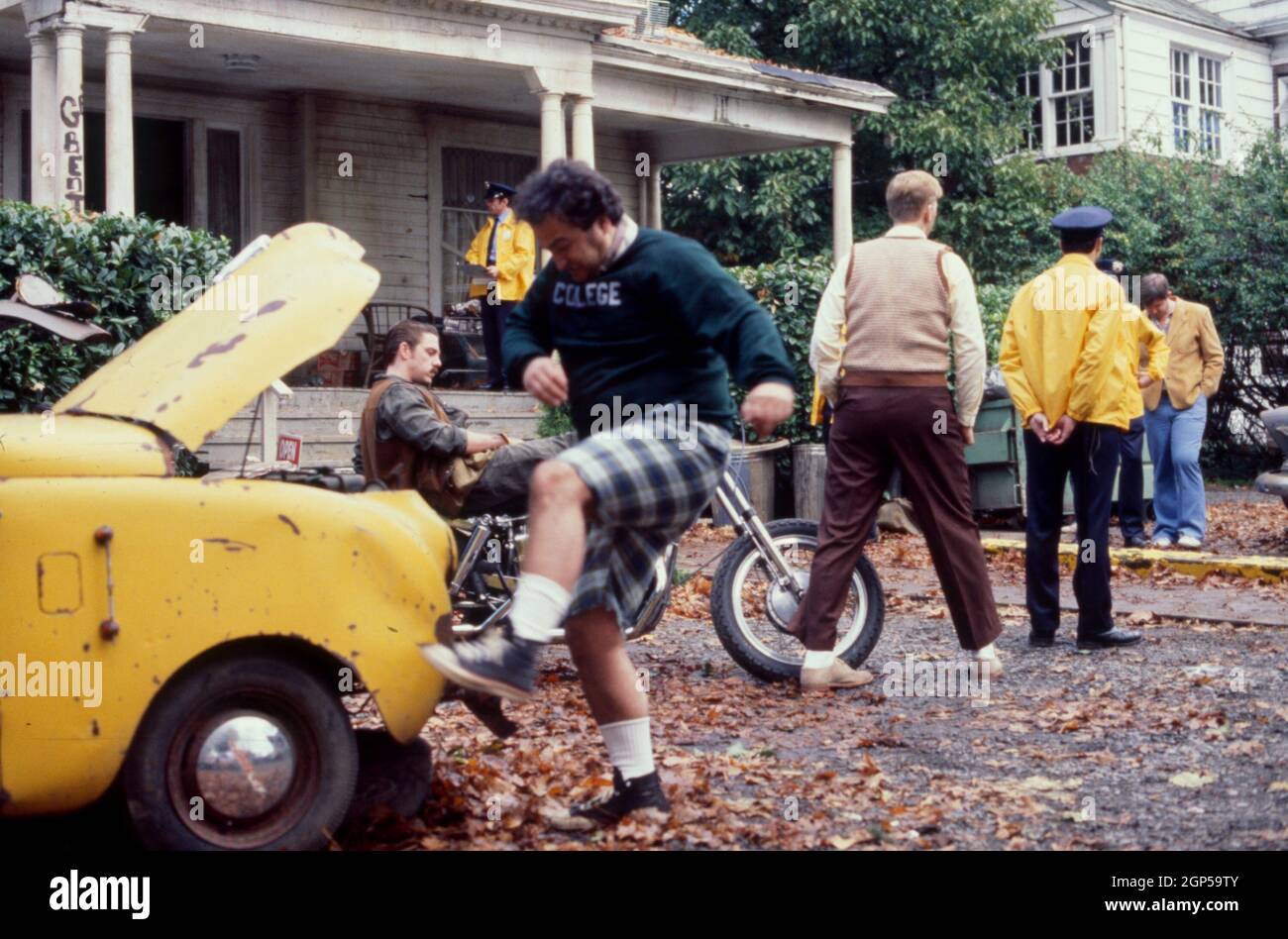 NATIONAL LAMPOON'S ANIMAL HOUSE, Delta Tau Chi Fraternity members from left: Bruce McGill, John Belushi, James Widdoes (back turned), 1978. © Universal Pictures / Courtesy Everett Collection Stock Photo