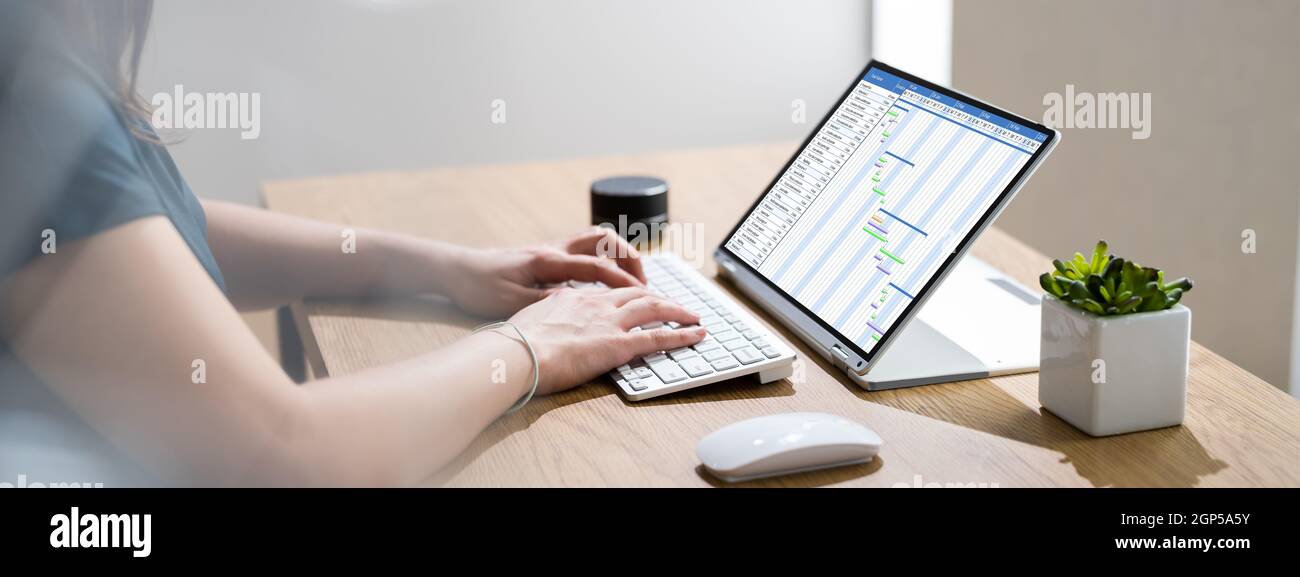 Gantt Chart Timeline Software On Convertible Laptop Stock Photo