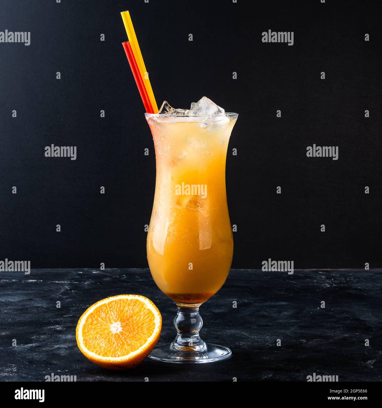 Alcoholic cocktail with vodka, ornage, mint and ice Stock Photo