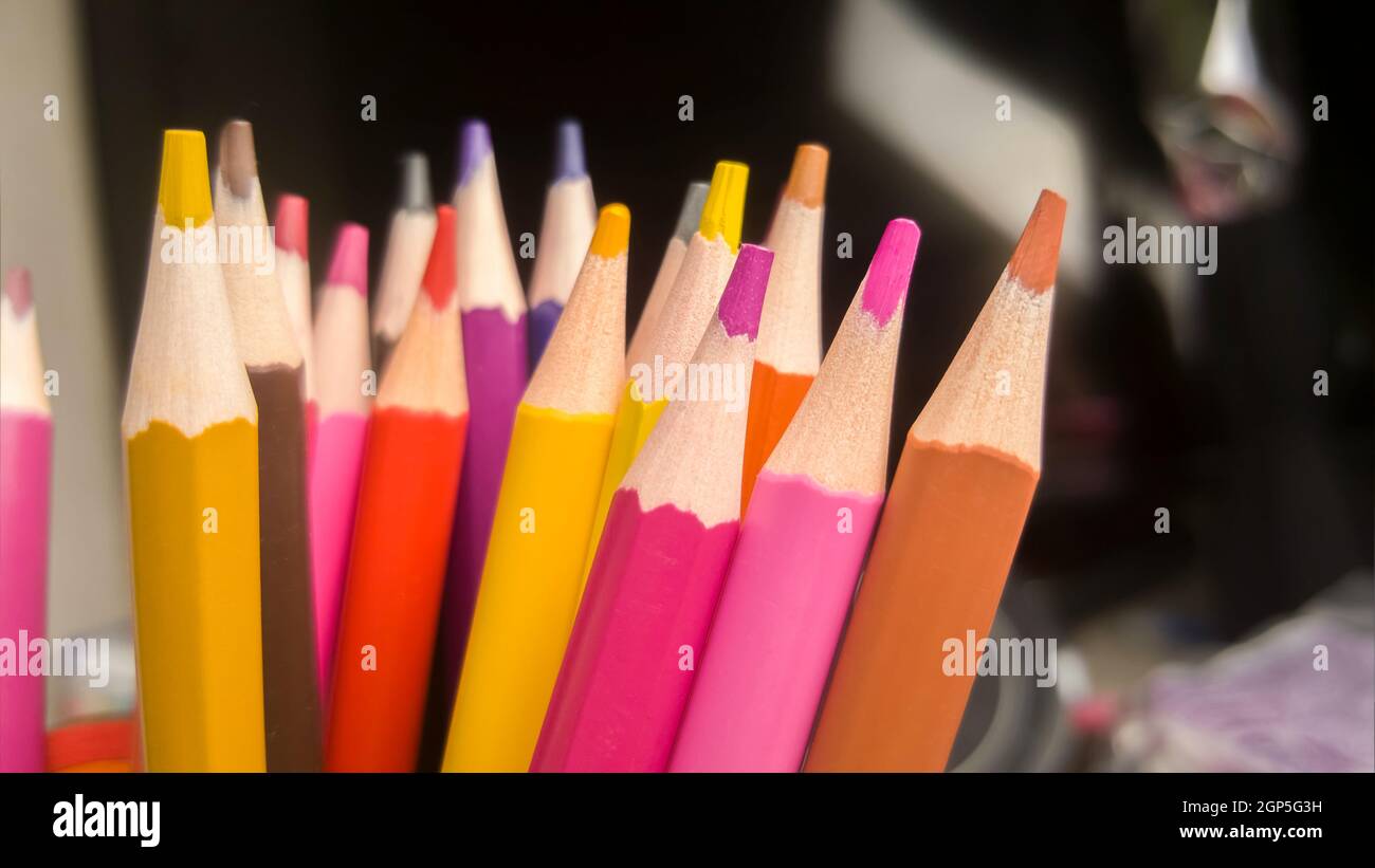 Colored Pencils With Eraser On Wooden Background Stock Photo, Picture and  Royalty Free Image. Image 185010963.