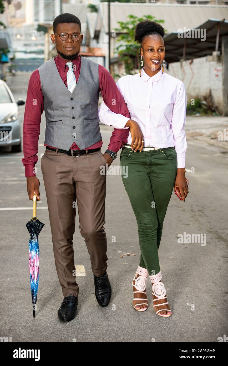African woman walking in suit hi-res stock photography and images - Alamy