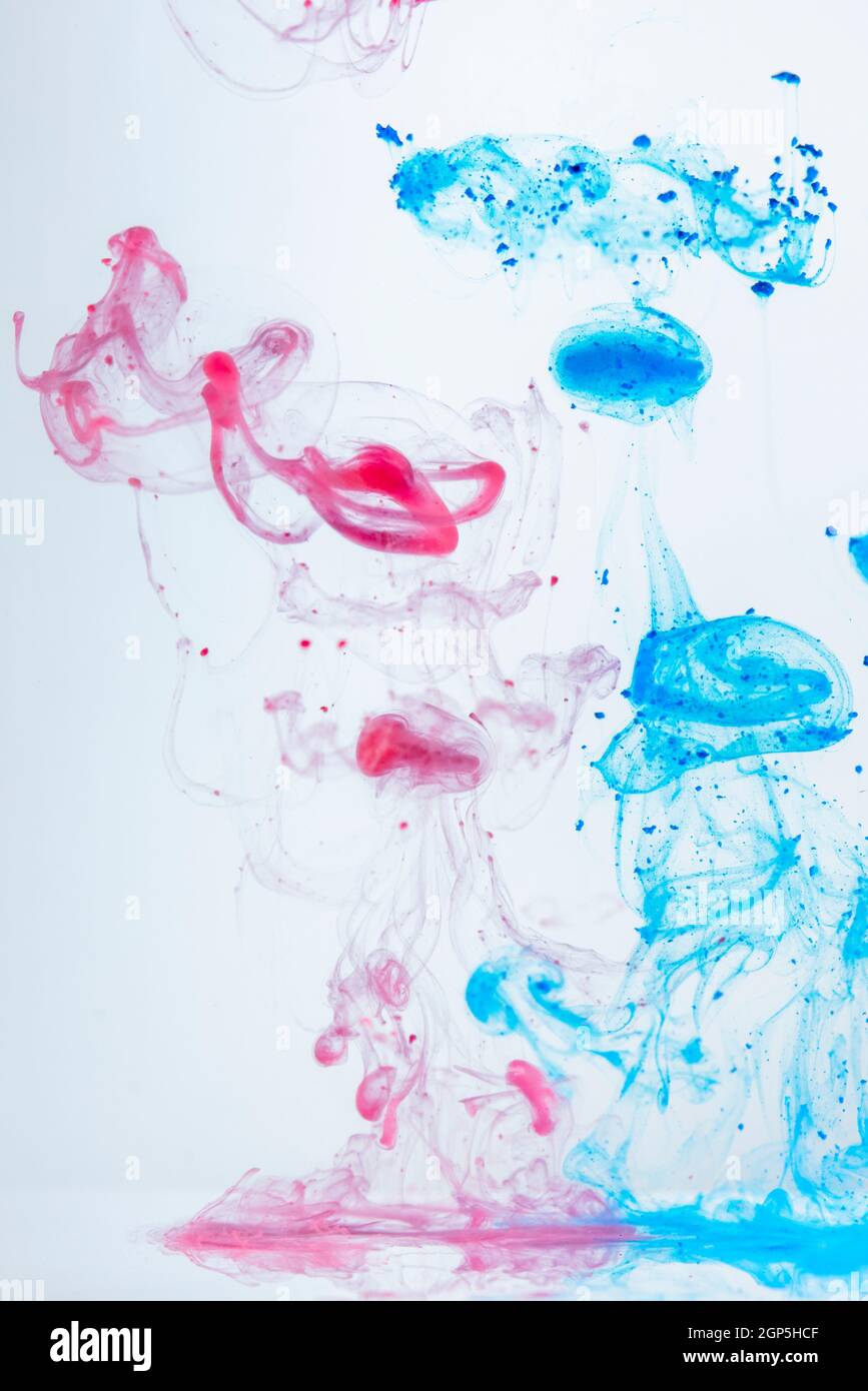 Coloured shapes and flows in liquid Stock Photo