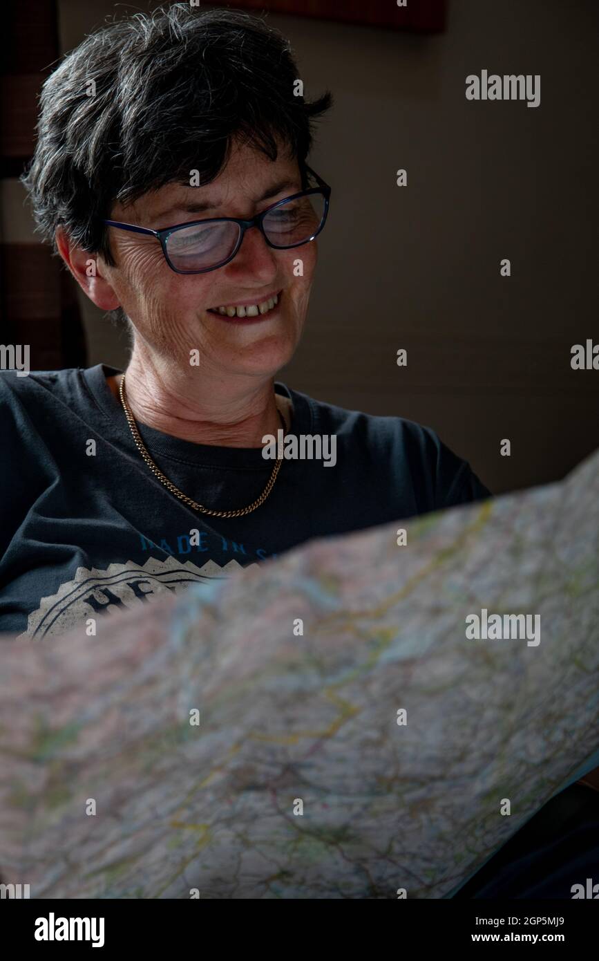 A woman studying a map Stock Photo