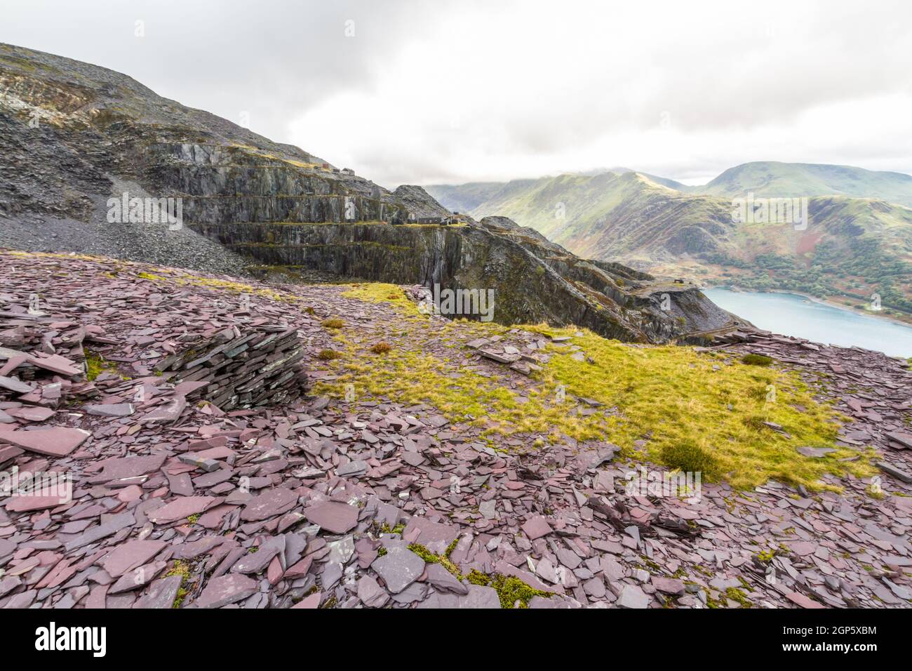 Dinorwic or Dinorwig Slate quarry, Lake Llyn Peris and Snowdonia Mountains in background Unesco World Heritage area. Stock Photo