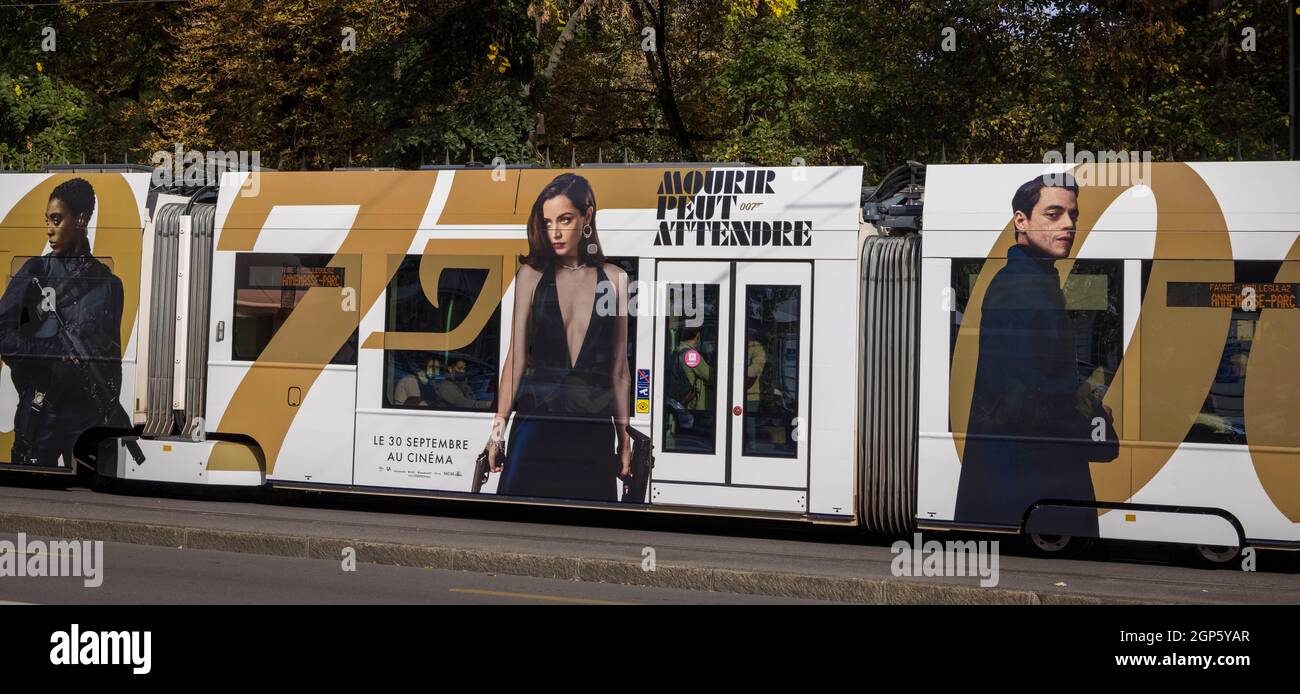 Geneva, Switzerland. 28th Sep, 2021. city tram advertising imminent release  on 30th September of the latest Jamed Bond film, No Time to Die (in French,  Mourir Peut Attendre) Credit: B.O'Kane/Alamy Live News