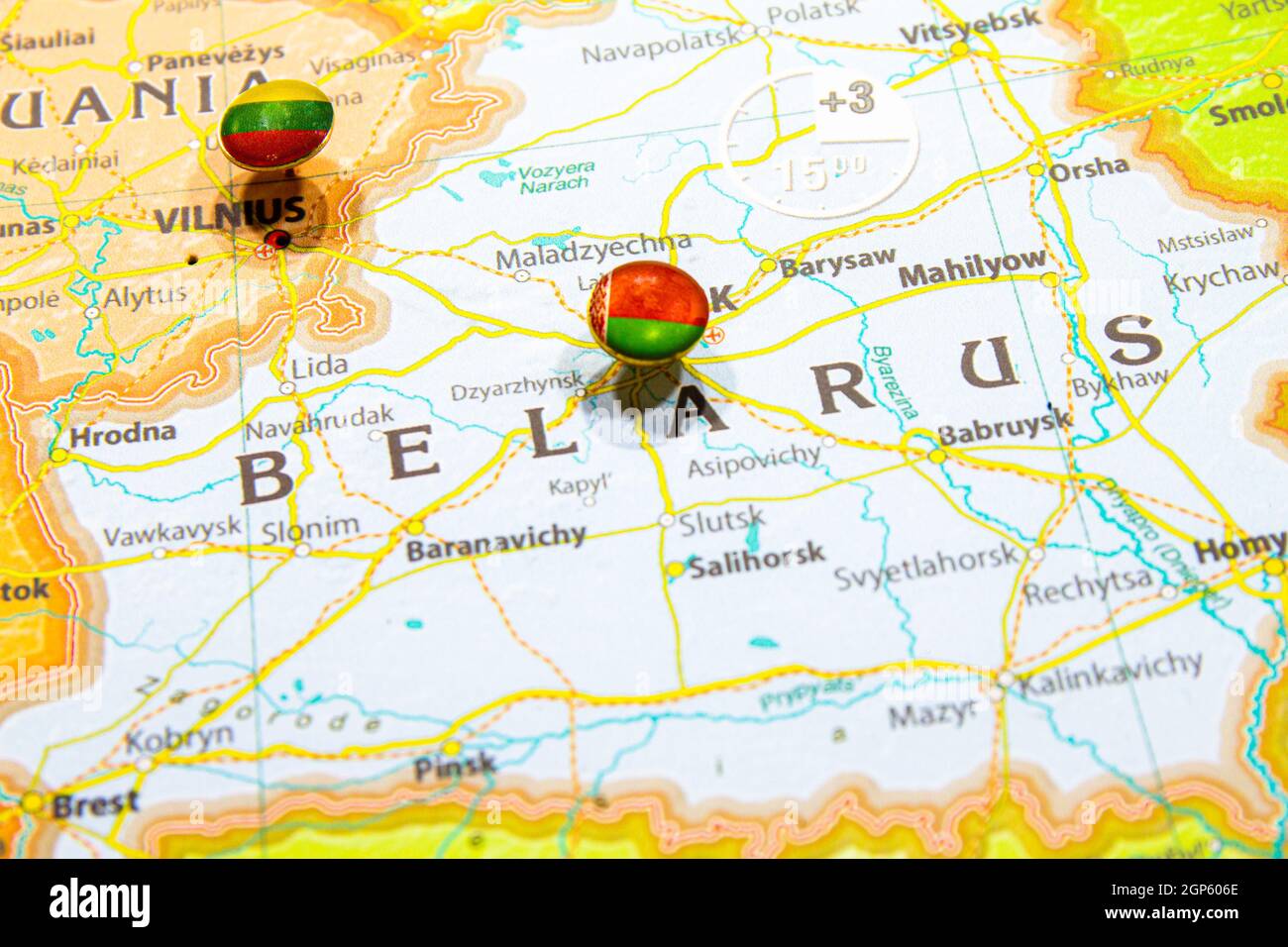 Belarus national flag pinned on Europe map. Macro Close up picture of country on a Colorful and Blurry World Map Globe with focus to Minsk capital of Stock Photo