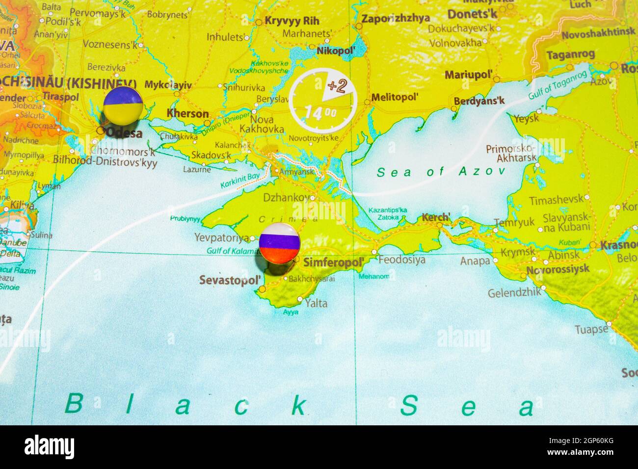 Close up view to Crimea with Russian flag pin. New land and sea borders of Ukraine and Russia territory on political map of Europe, geographical globe Stock Photo