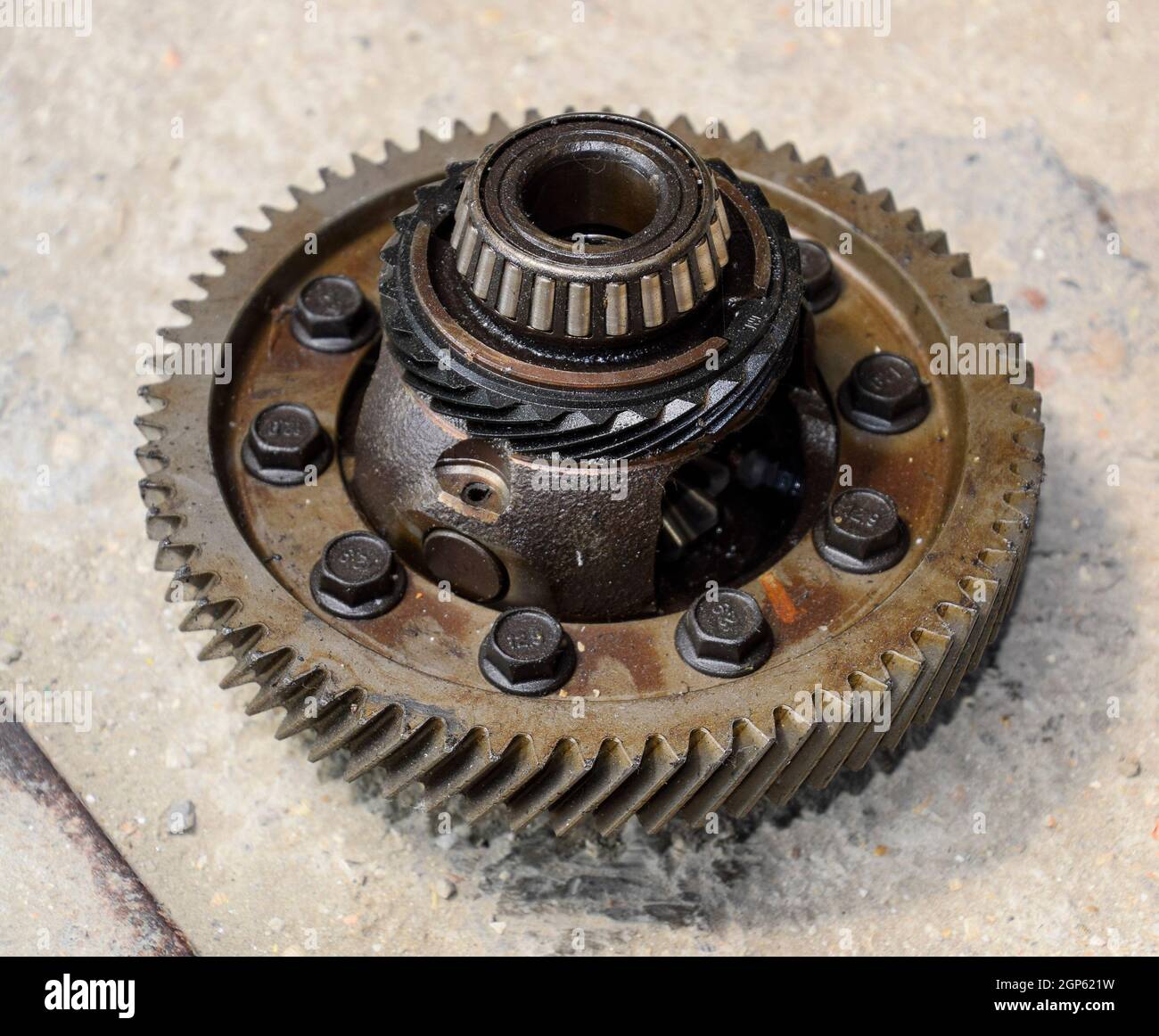 Dismantled box car transmissions. The gears on the shaft of a