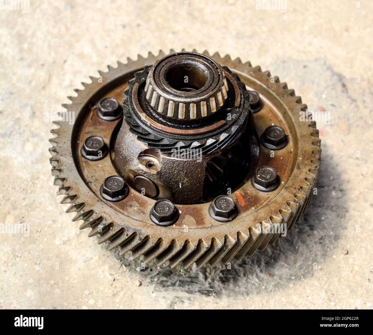 Dismantled box car transmissions. The gears on the shaft of a