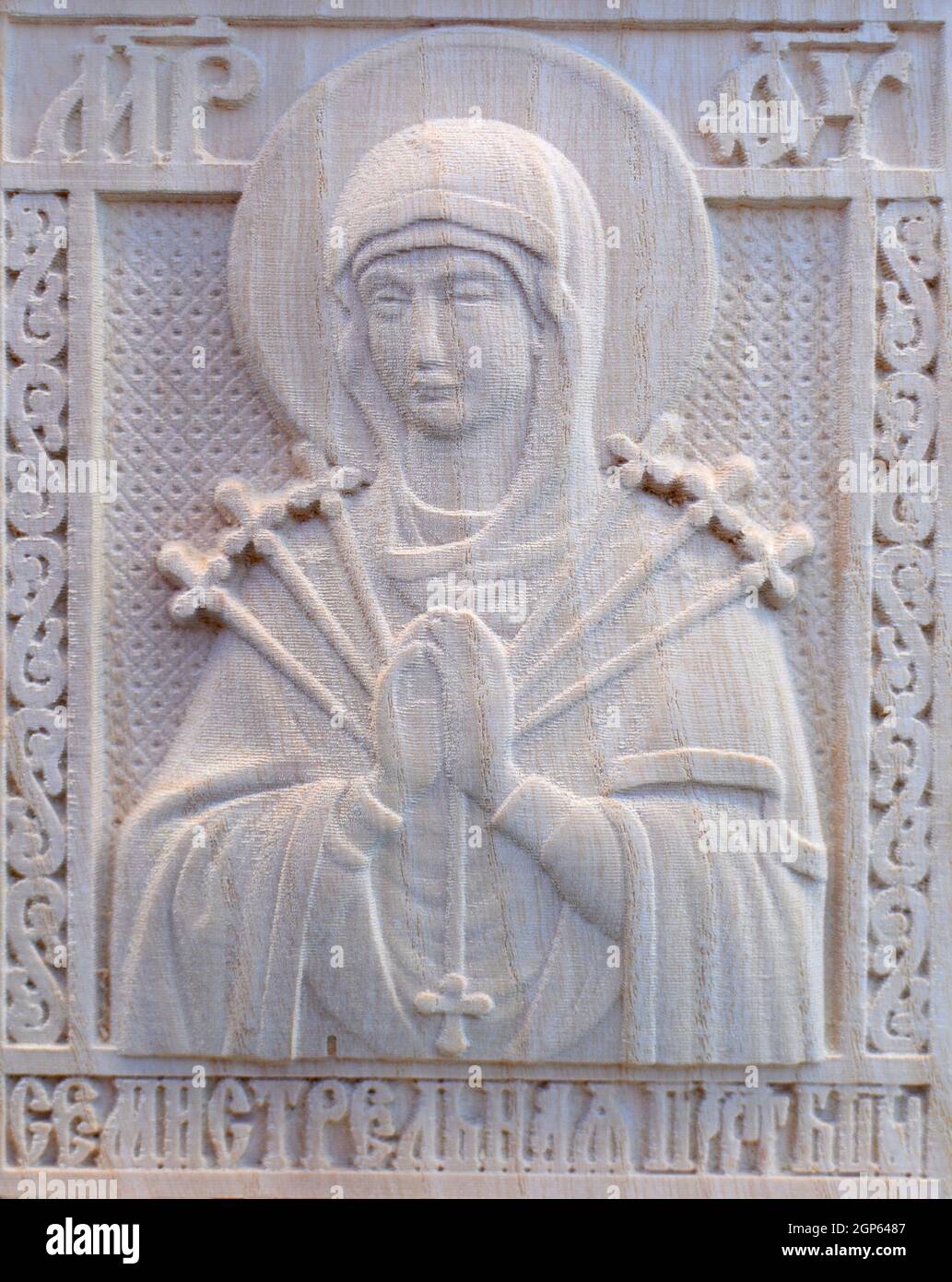 Carving on the machine with numerical control. Cut cutter machine icon of the Virgin Mary. Stock Photo