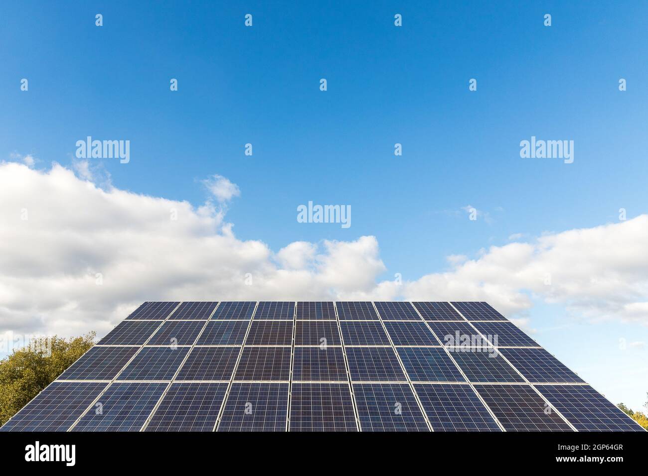 photovoltaic solar power panel on sky background, alternative ...