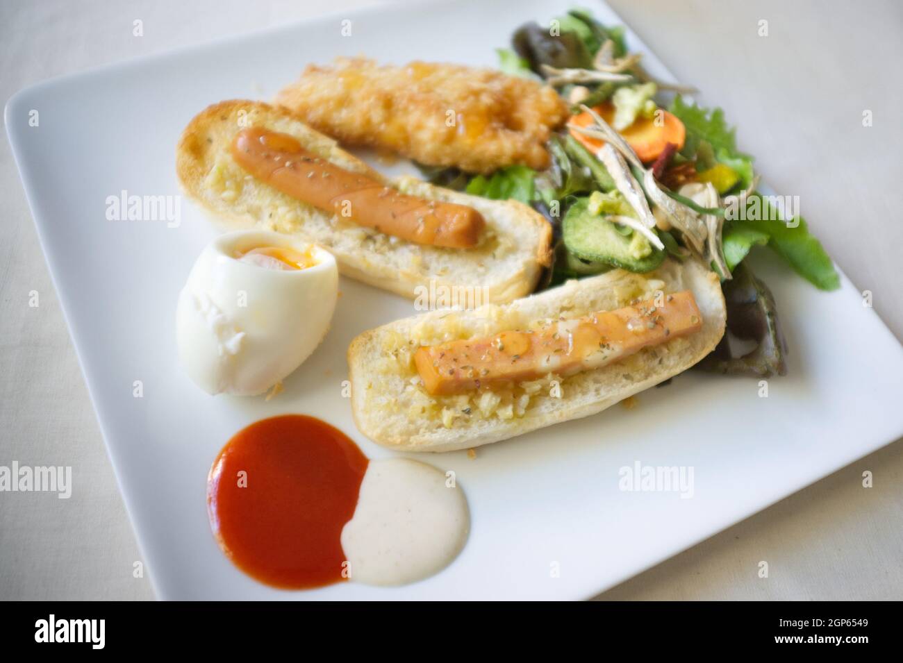 Close up , Breakfast set of toast , Fried chicken and Boiled egg. Stock Photo