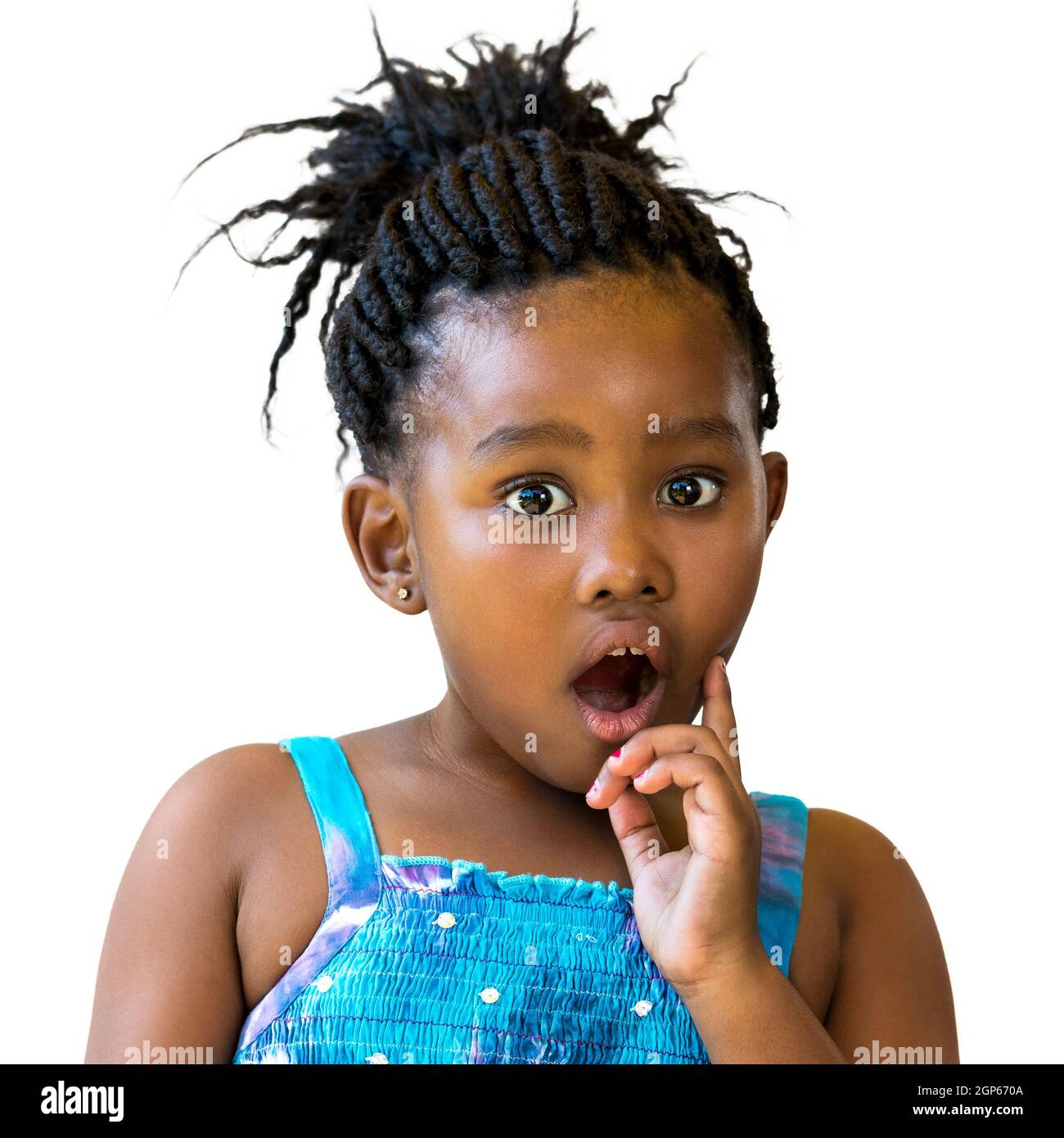 Close up portrait of little african girl with surprising face expression.Kid with open mount and one hand on cheek isolated on white background. Stock Photo