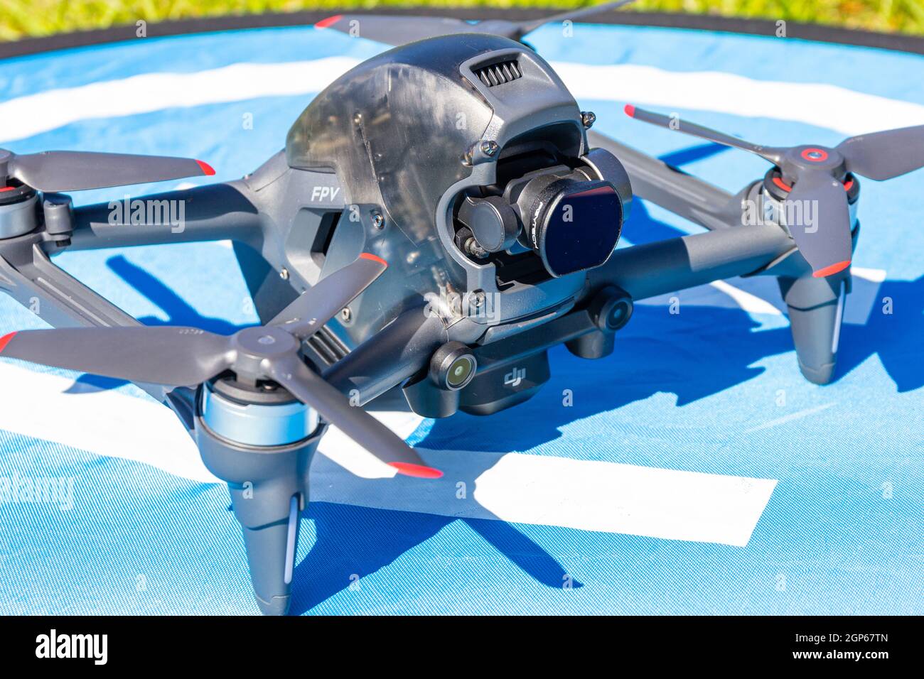 Moscow Russia - 30 may 2021: Close-up picture new aerial DJI FPV drone on fly landing pad. Top front view uav quad copter with 4K 60 fps Digital Camer Stock Photo