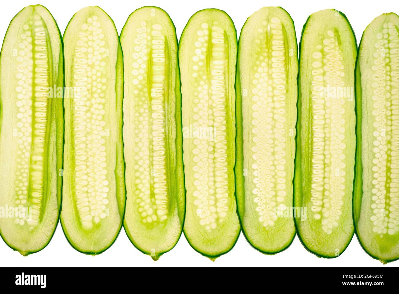 fresh transparent cucumber slices on white background Stock Photo