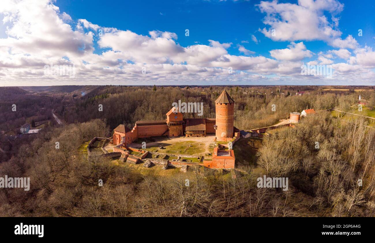 Aerial view over River Gauja valley, with Turaida Castle in the middle of it during cloudy summer day, Sigulda, Latvia Stock Photo