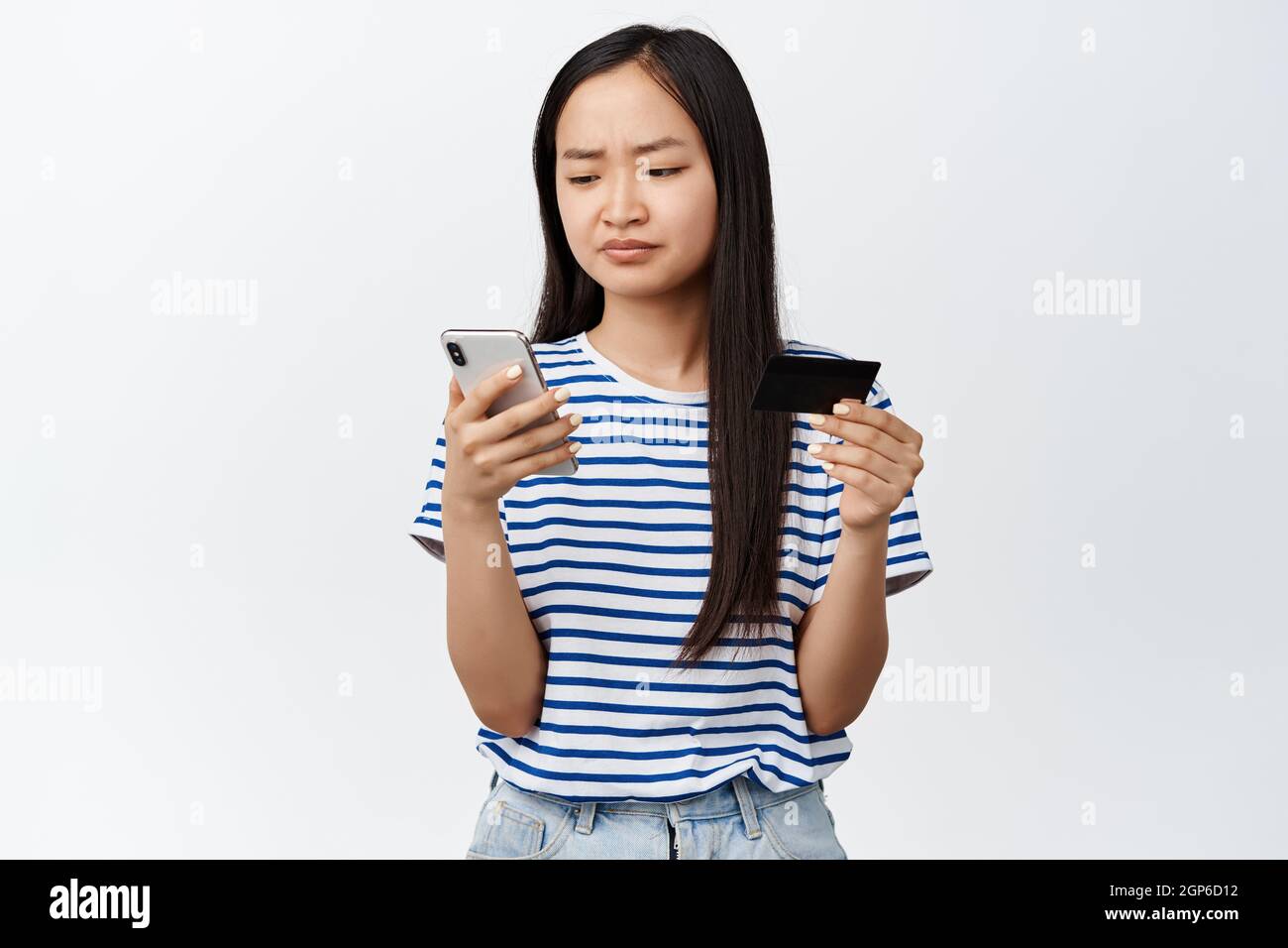 Asian girl has difficulties with online shopping app, problem during