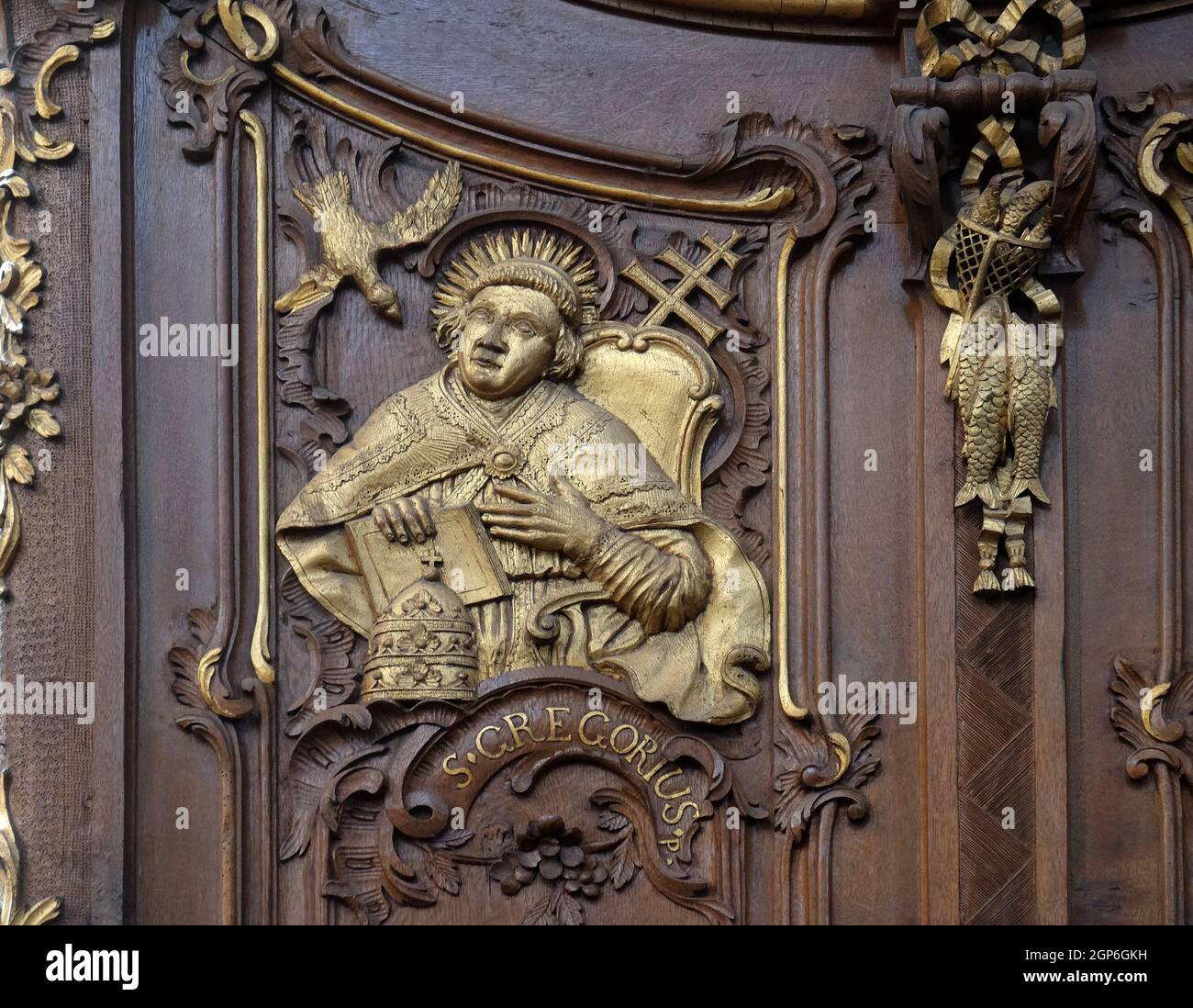 Saint Gregory the Great, one of the Latin Fathers of the Church, choir stalls by Daniel Aschauer in Cistercian Abbey of Bronbach in Reicholzheim near Stock Photo