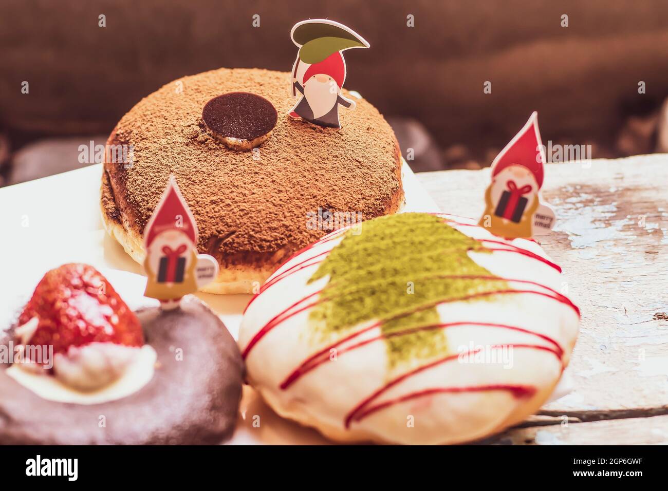 Christmas homemade desserts on table in decorated New Year background Stock Photo