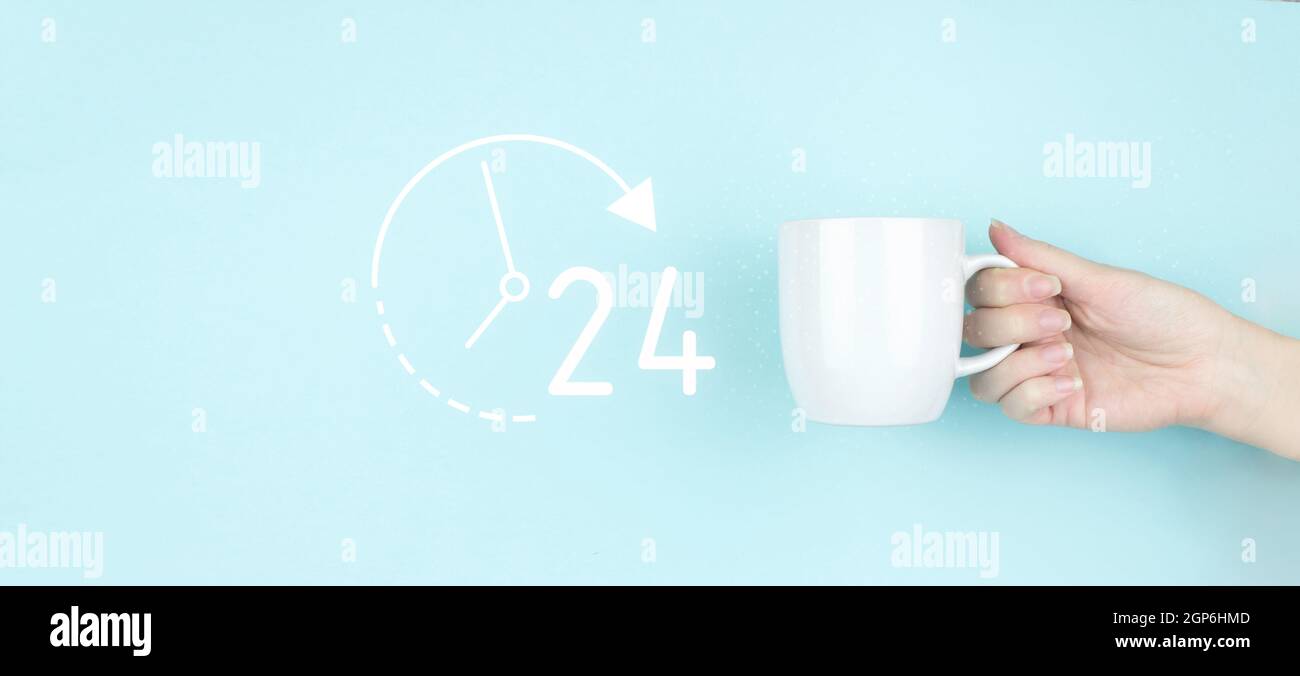 Full time service concept. Girl hand hold morning coffee cup with sign 24 7 all day all night Icon on blue background Stock Photo