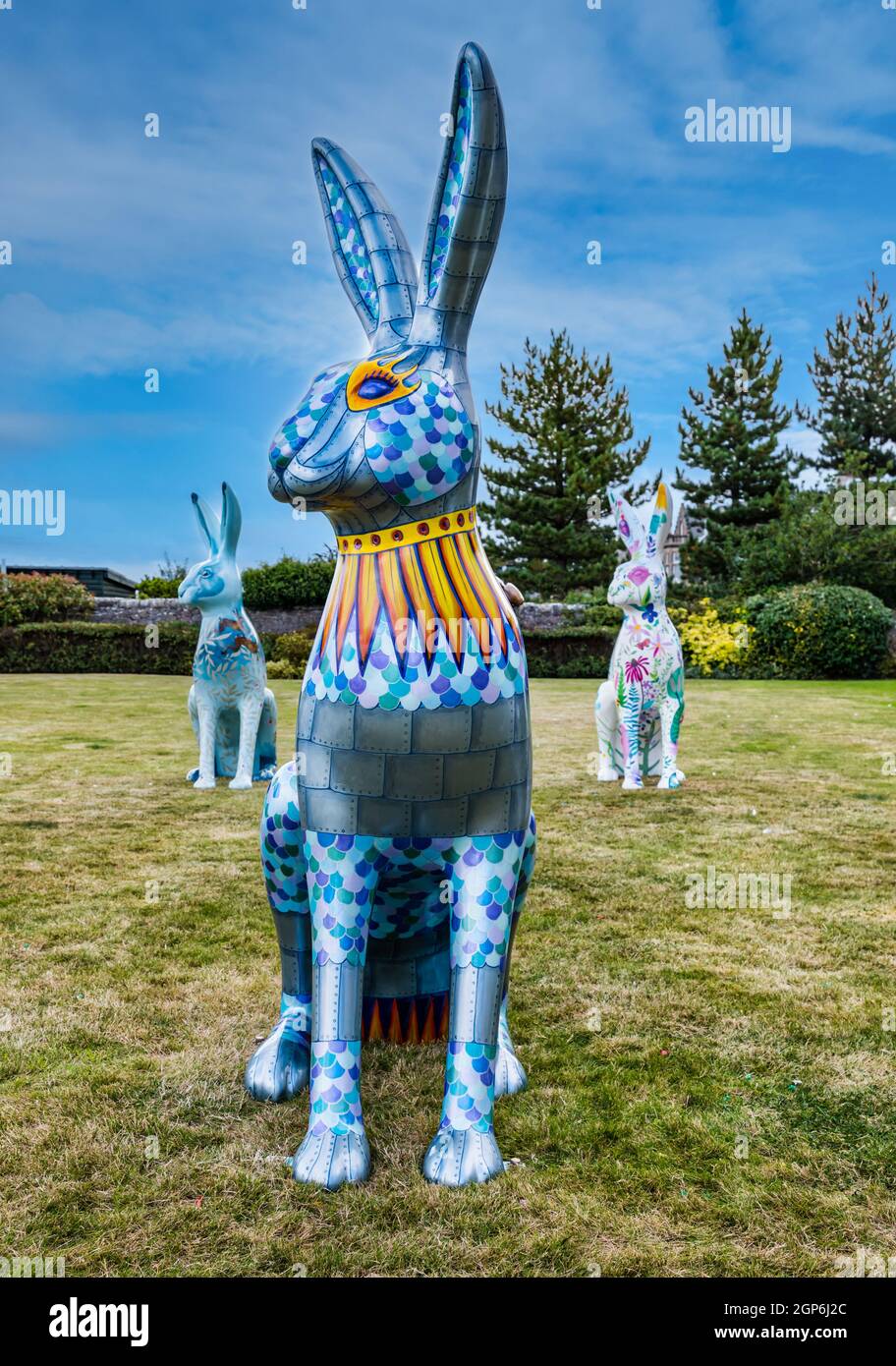 Giant painted hare sculptures on lawn, Marine Hotel, North Berwick