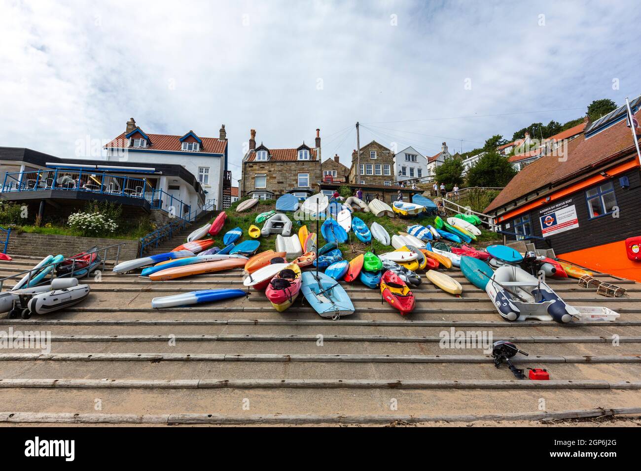 Boats and Kayak in Runswick Bay, Yorkshire and the Humber, England, UK