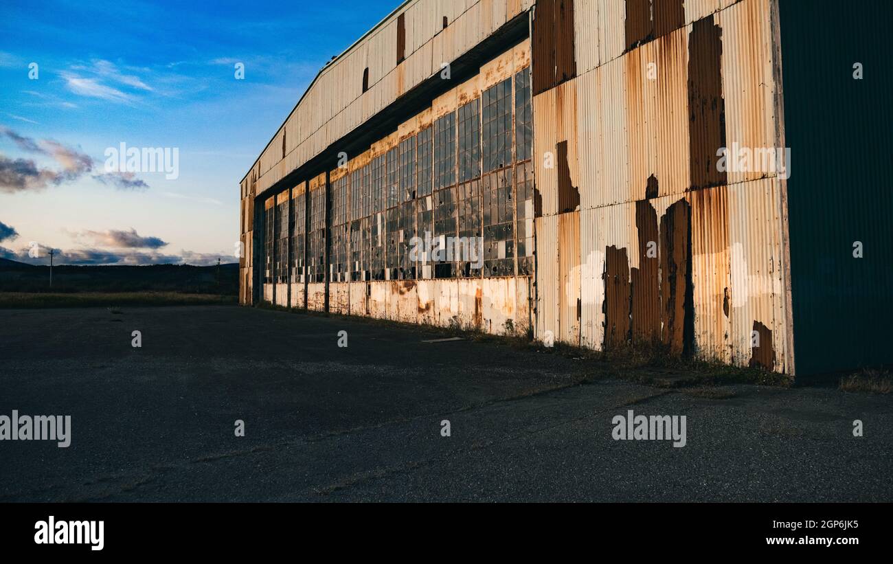 Abandoned building with broken glass windows Stock Photo - Alamy