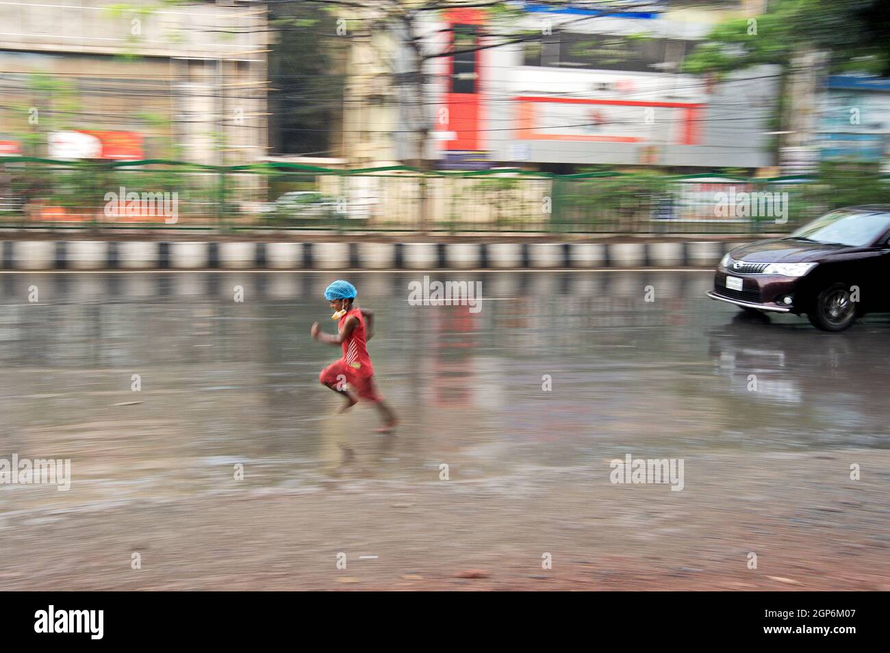 Girl in wheelchair in rain hires stock photography and images Alamy