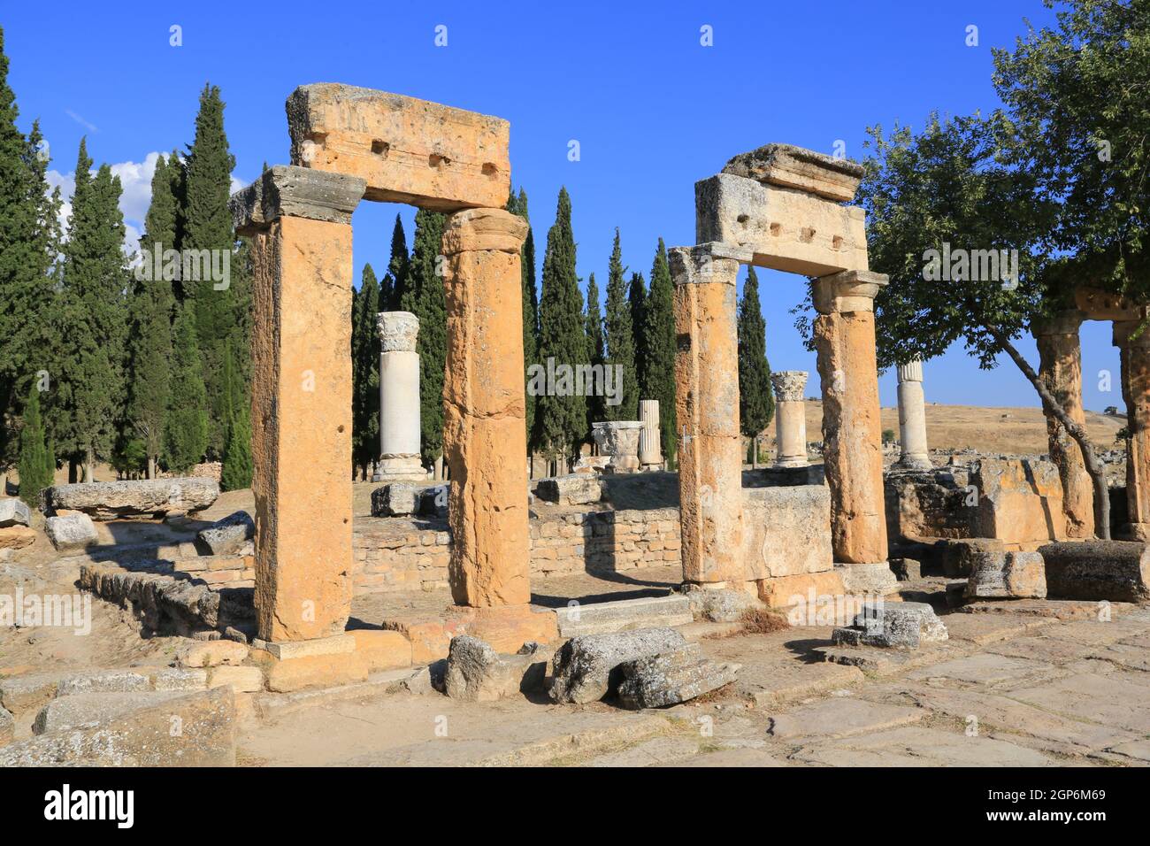 Columns by the latrine at the ancient spa city of Hierapolis date from 190 BC and are near the travertine terraces of Pamukkale in Western Turkey. Stock Photo