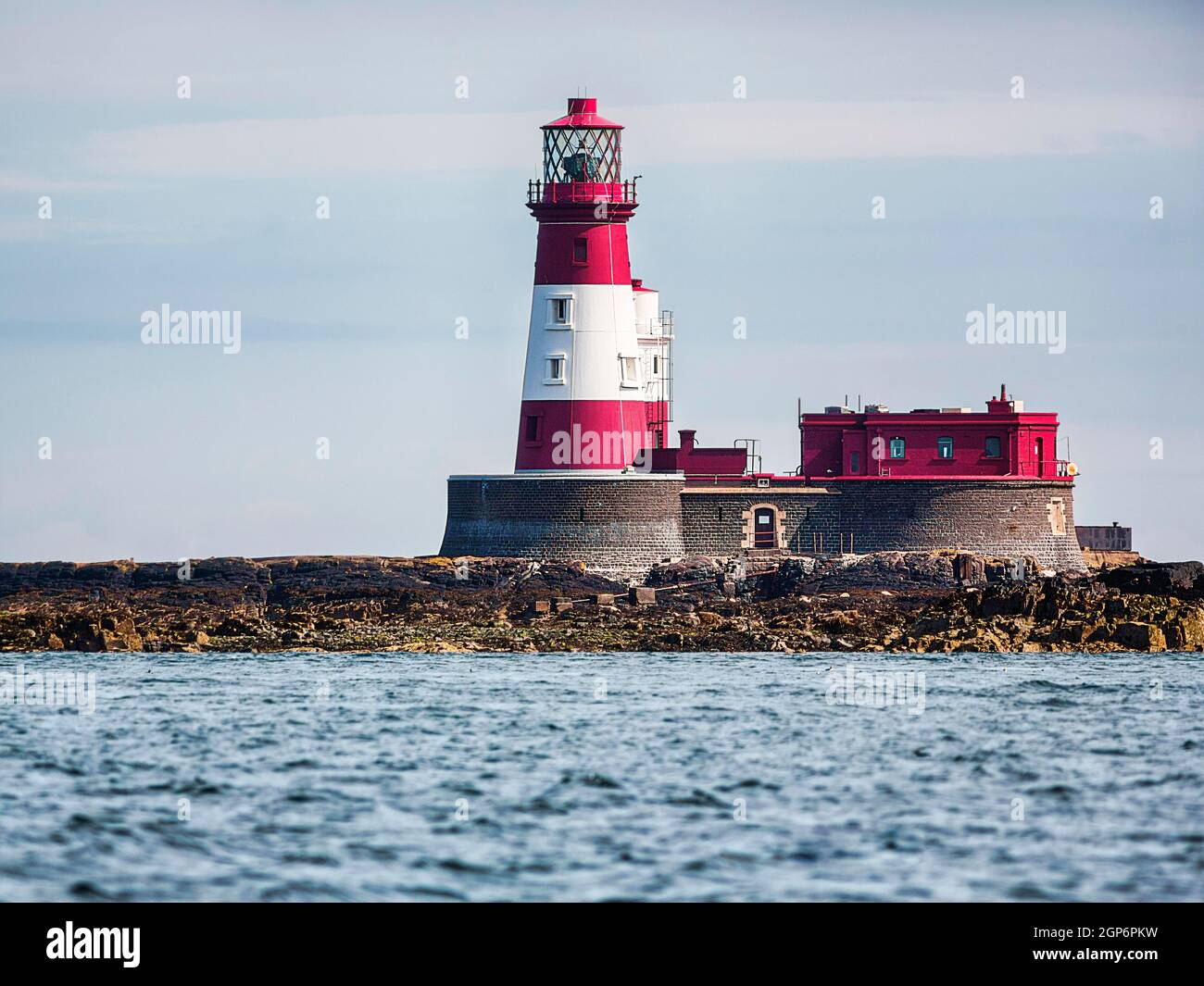 Red and White Lighthouse, Longstone Lighthouse, Longstone Rock, Farne Islands, Northumberland, England, United Kingdom Stock Photo