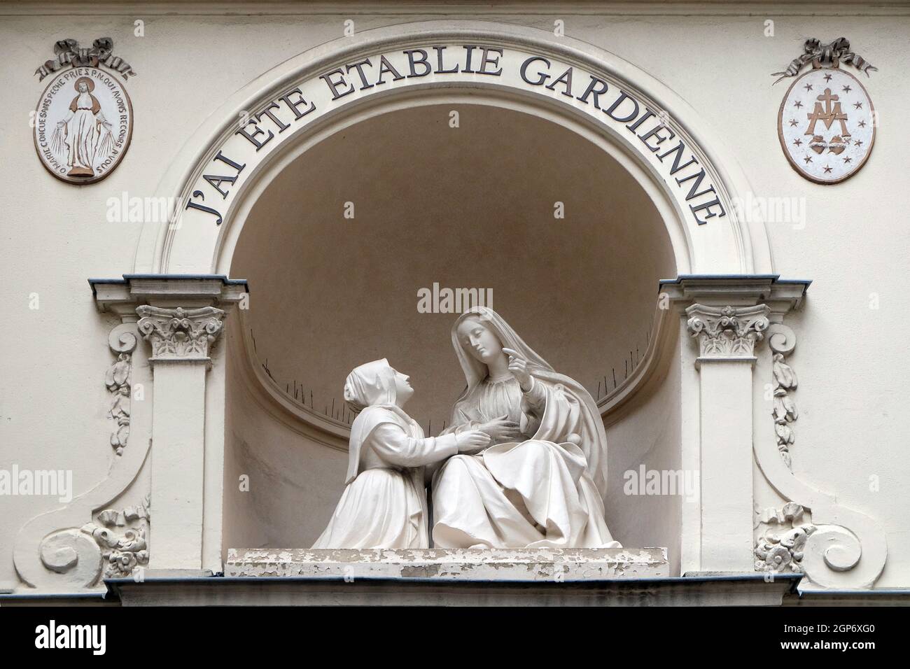 Statue of St Catherine and the Virgin Mary outside the Chapelle Notre Dame de la Medaille Miraculeuse in Paris, France Stock Photo