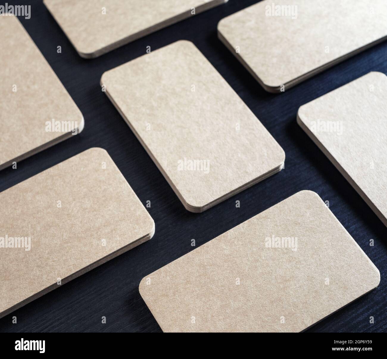 Many blank kraft business cards. Blank paperwork template for placing