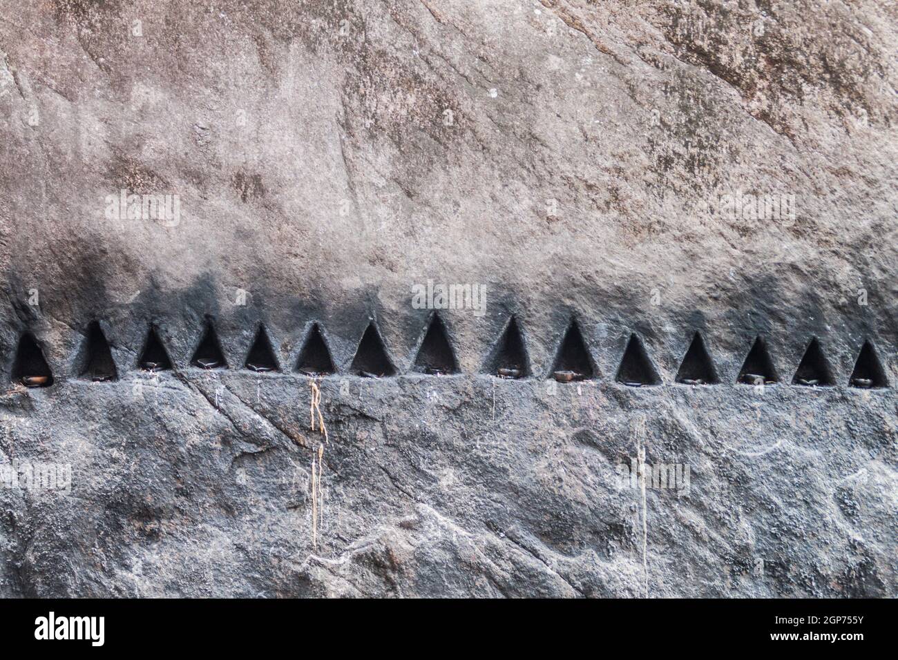 Candle niches at Aluvihare Rock Temple, Sri Lanka Stock Photo Alamy