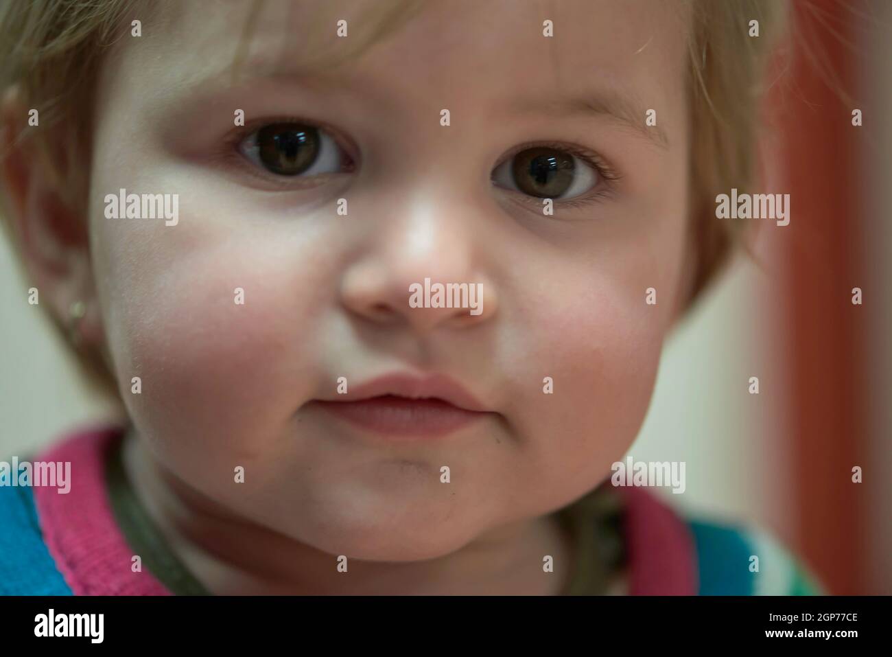 Closeup portrait of the one year old sweet baby girl Stock Photo