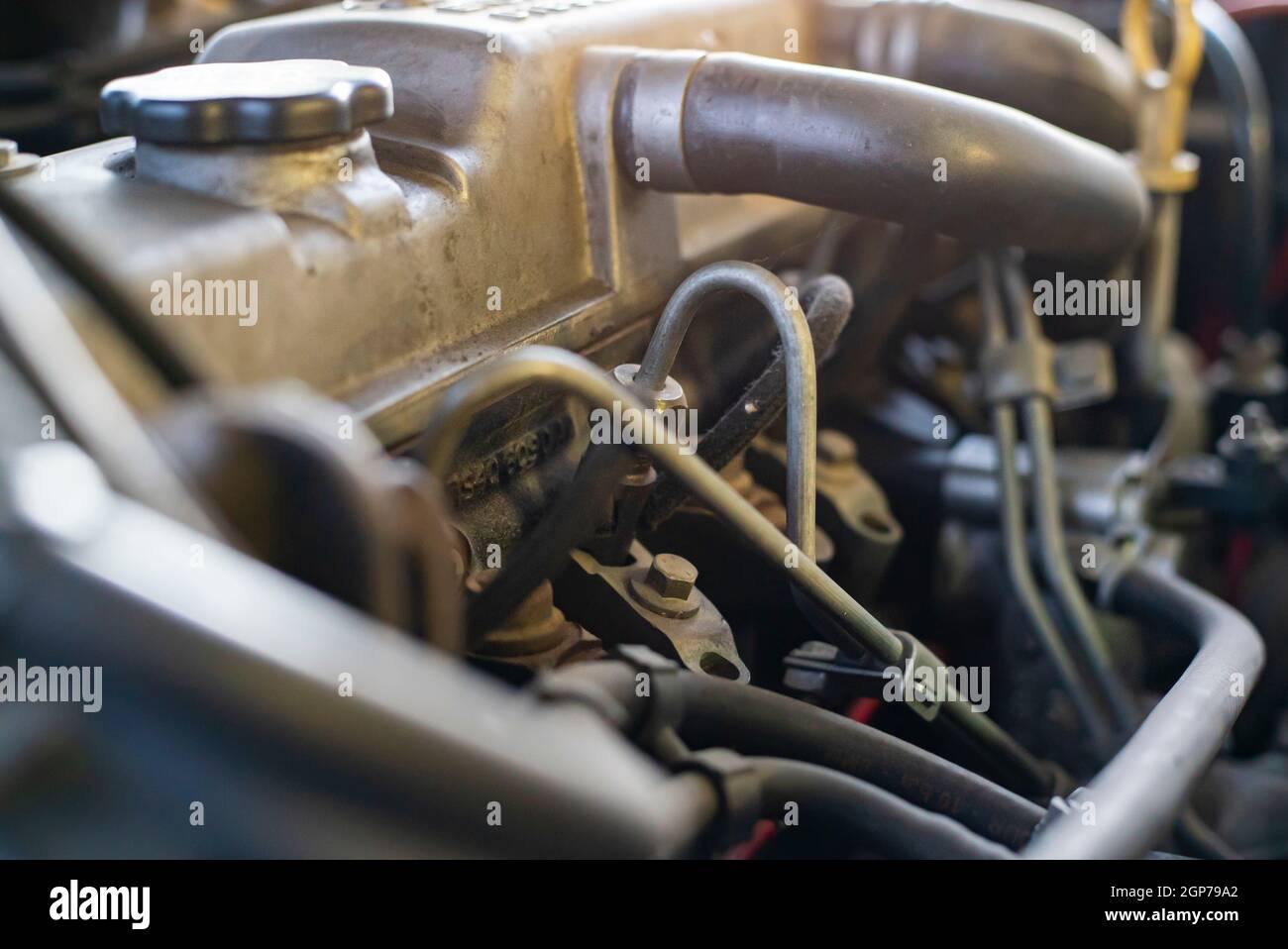 Detail of the diesel injectors in a car engine being repaired Stock