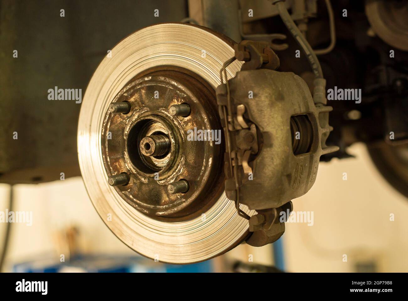 Detail of a worn disc brake ready for replacement and maintenance Stock Photo