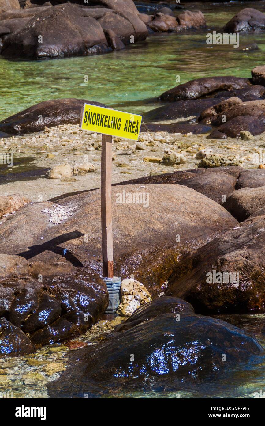 Sign 'Snorkeling Area' at Pigeon Island National Park near Nilaveli village in Sri Lanka. Stock Photo