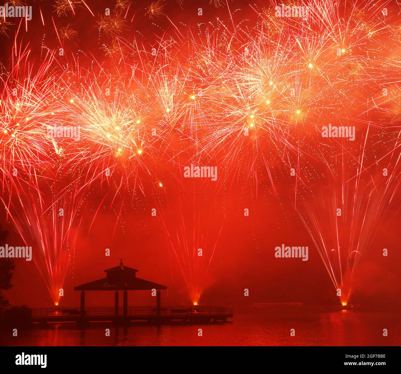 Fireworks at Delco Park. Fishing pier and pavilion silhouette in