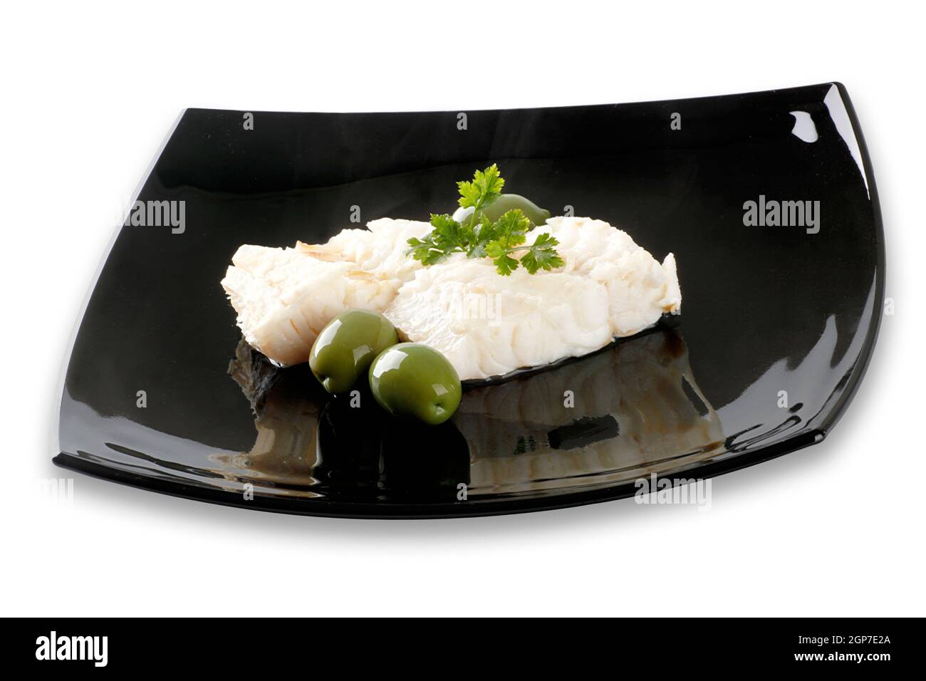 Fillet of cod with olives and parsley Stock Photo