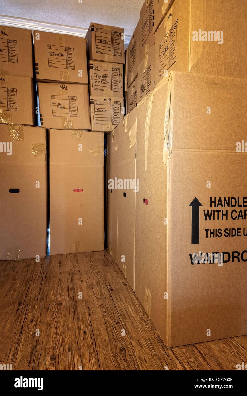 Moving boxes in a residential house Stock Photo - Alamy