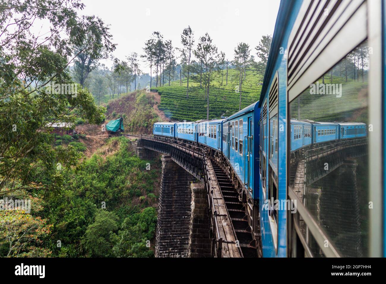 Local train rides through mountains near Bandarawela, Sri Lanka