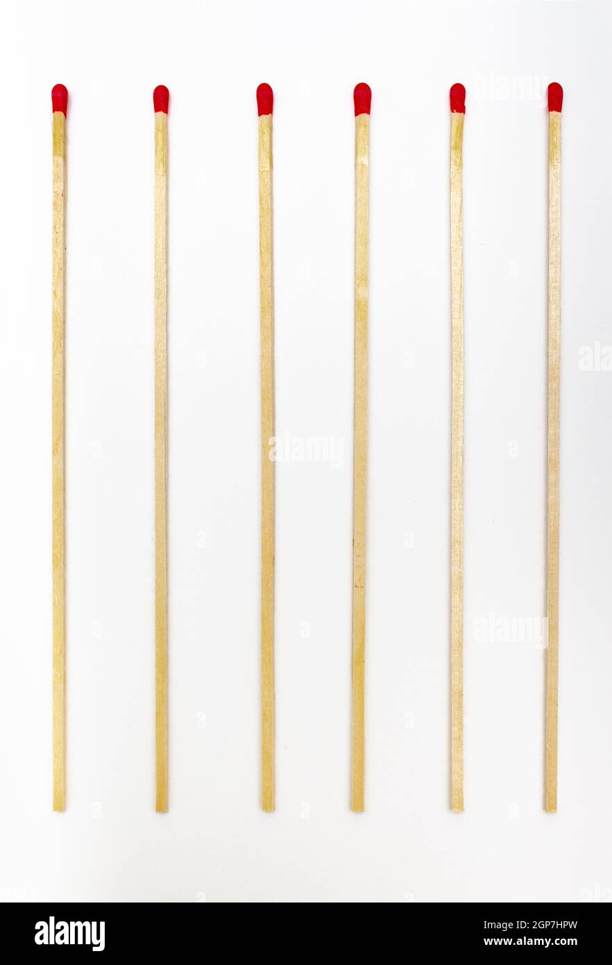 Many matches sticks for lighting a fire on white background. Stock Photo