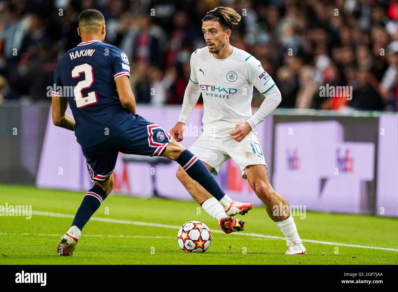 Vuil Rennen betaling PARIS, FRANCE - SEPTEMBER 28: Achraf Hakimi of Paris Saint-Germain and Jack  Grealish of Manchester City FC during the Champions League match between Paris  Saint-Germain and Manchester City FC at Parc des