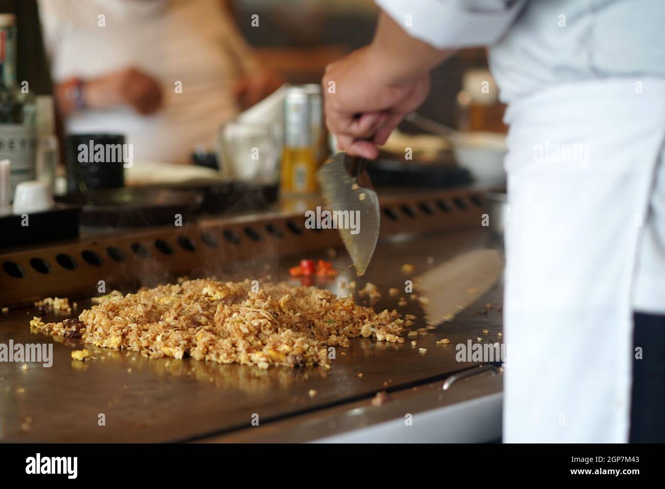 Professional chef mixing frying meat hi-res stock photography and ...