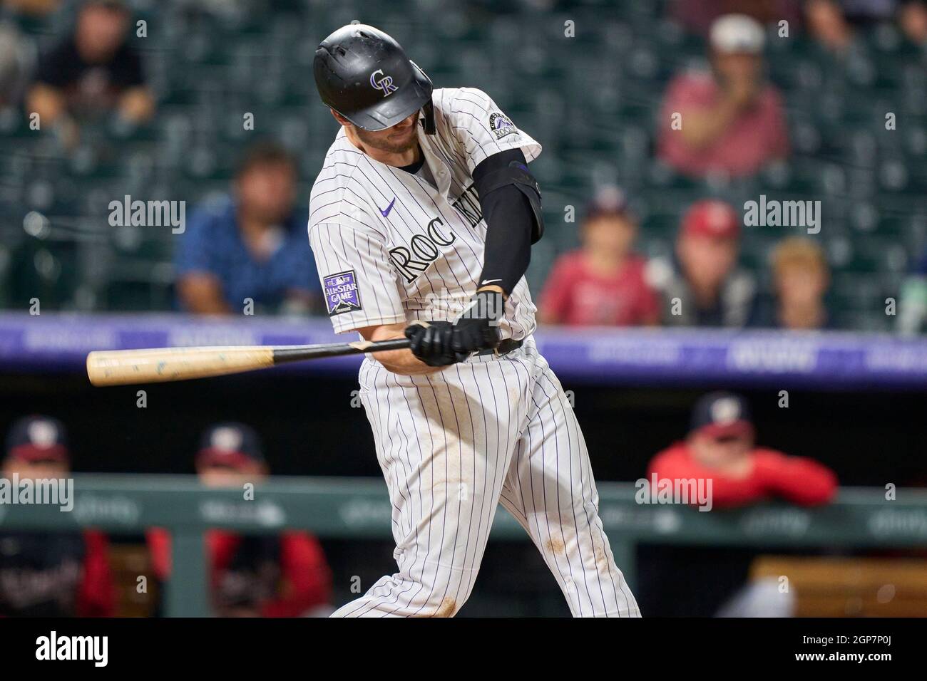 DENVER, CO - SEPTEMBER 08: Colorado Rockies first baseman C.J. Cron (25)  fields his position during an MLB game against the San Francisco Giants on  Sept. 8, 2021 at Coors Field in